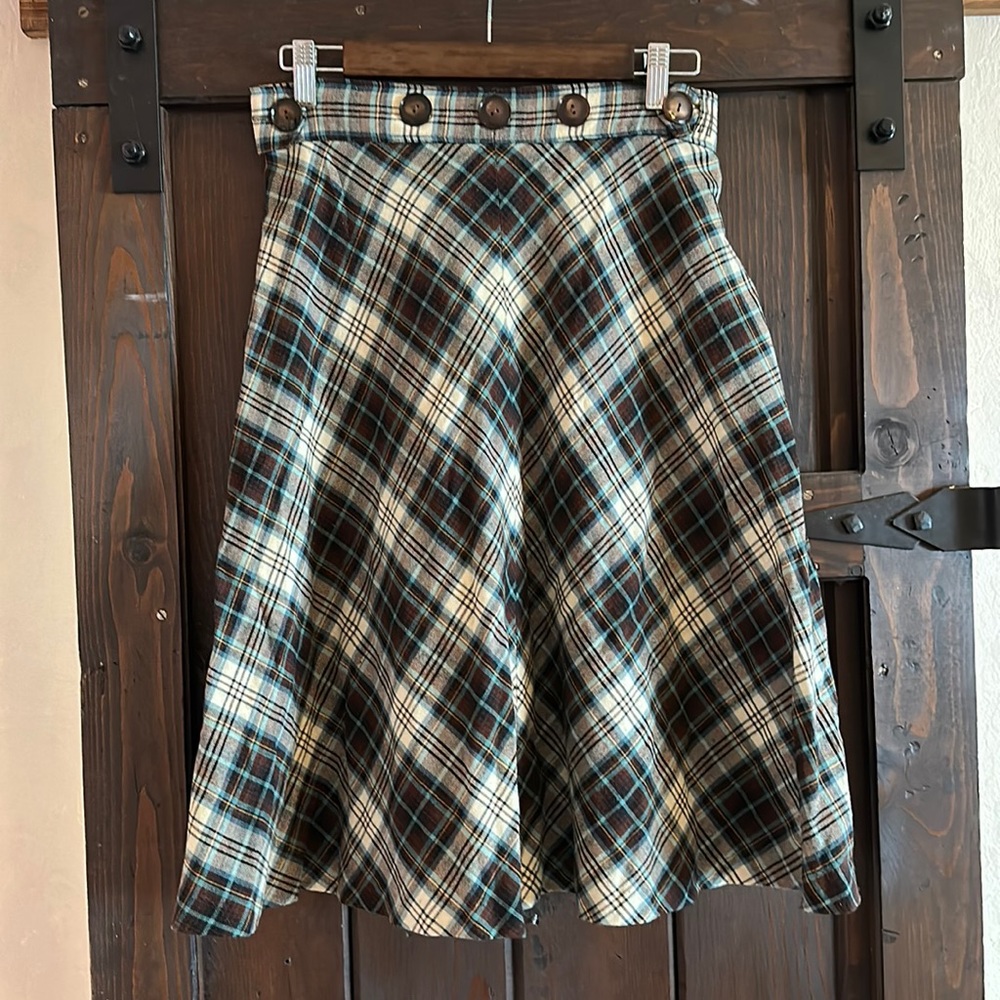 HandMade (not by me) wrap around plaid skirts. Light weight flannel material.